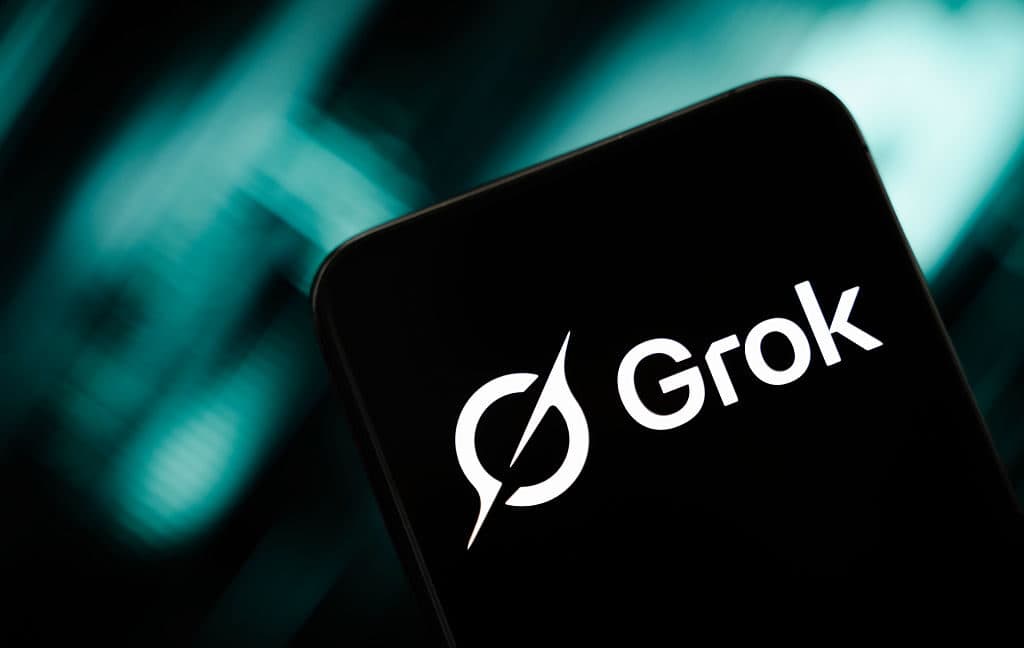 X logo displayed on a smartphone screen