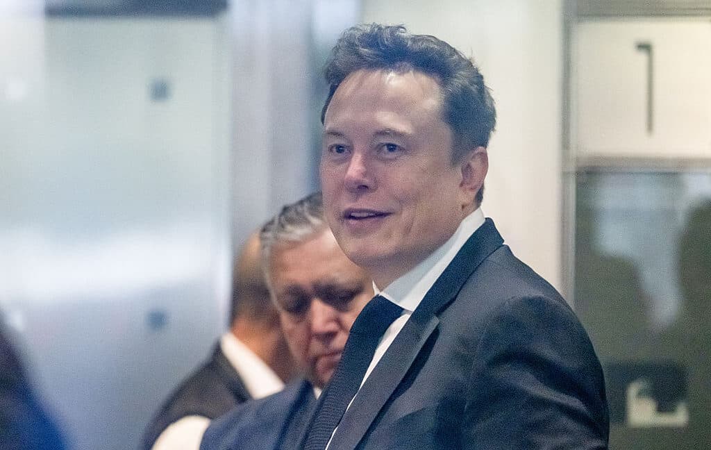 Elon Musk entering a US federal courthouse during the OpenAI trial