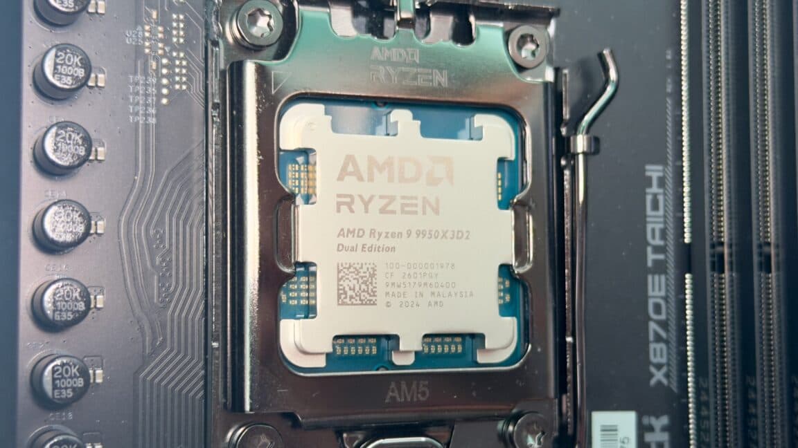 Close-up of an AMD Ryzen 9 desktop processor installed in a gaming motherboard