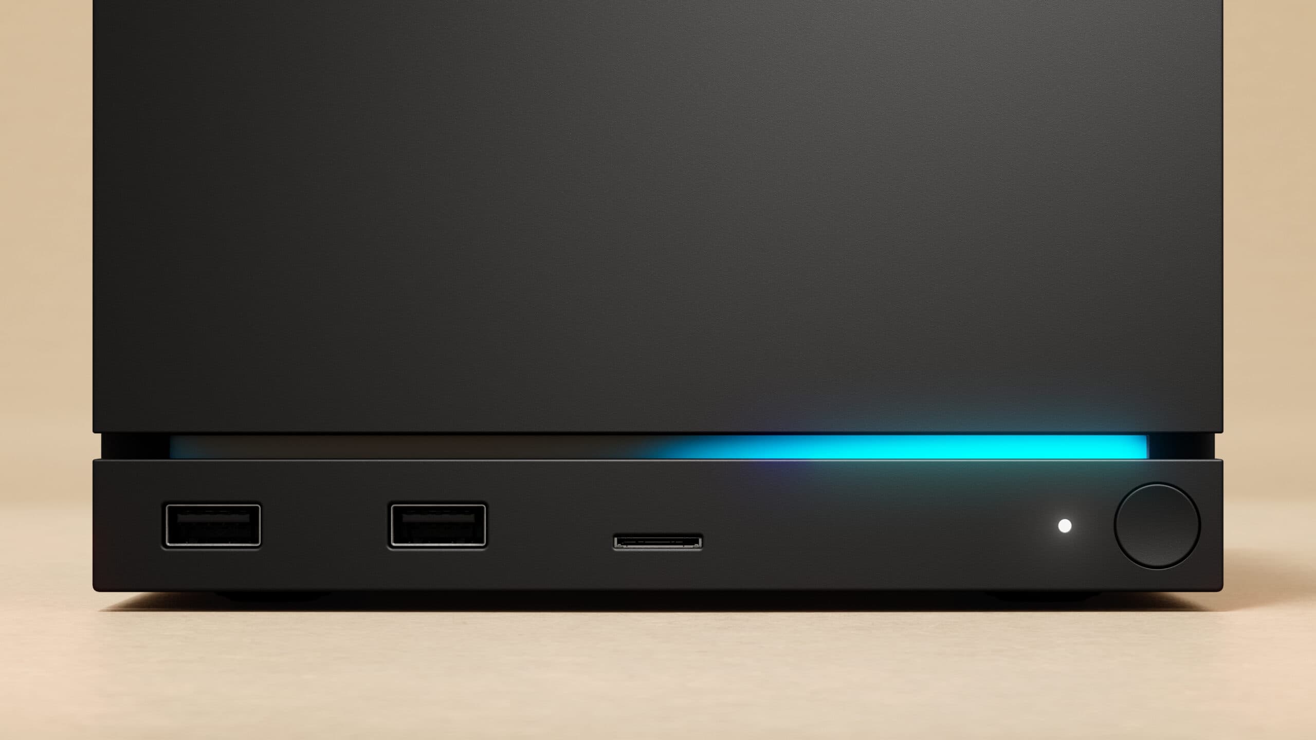 Steam Machine-style gaming PC connected to a TV with a glowing LED front strip