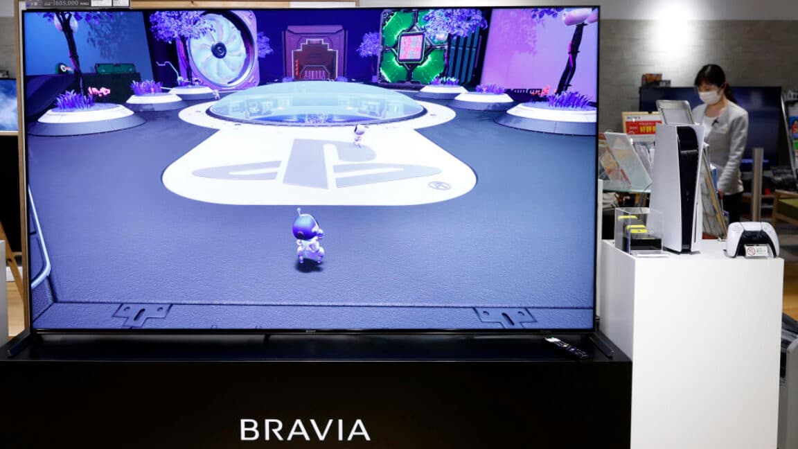 Sony PlayStation 5 console displayed next to a Bravia XR 4K TV in a Tokyo showroom