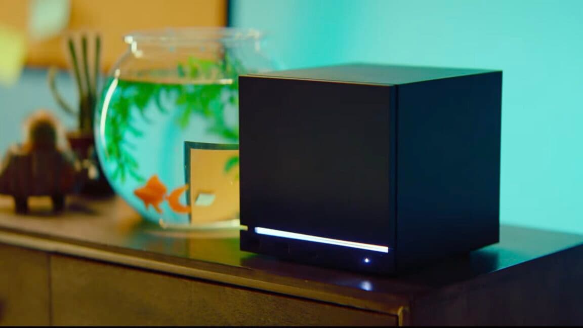 Render of Valve Steam Machine desktop PC and Steam Frame VR headset on a desk