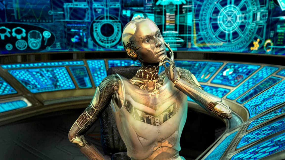 Person sitting at a desk looking at an AI chatbot answer on a laptop screen